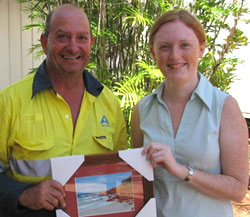 Sarah Hanks presents Peter White with a momento of his time with CDU