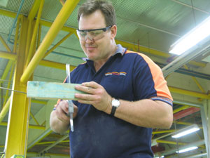 Mature-age carpentry apprentice John Glasson learns his trade