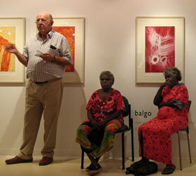 Dr Colin Laverty and artists Sarah Napanangka and Nora Wompi at the opening of the new Balgo exhibition