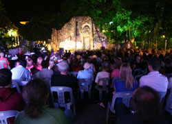 An Evening of Poetry, Prose, Theatre and Light audience admire the spectacular ambience of the Town Hall Ruins
